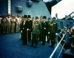Japanese delegation stands before the Allies on the Missouri's 'veranda deck.