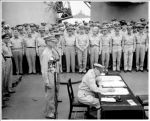 General MacArthur signs as Supreme Allied Commander (SCAP)
