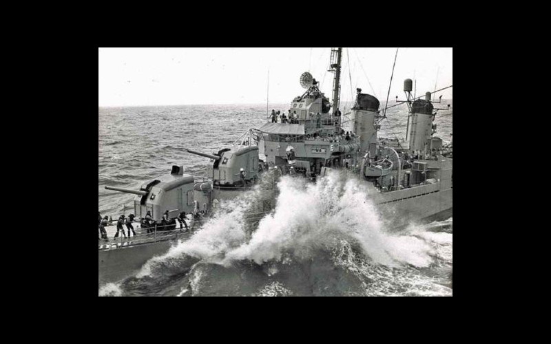 Alongside USS Hancock (CVA 19): Personnel transfer at sea to Tingey (DD 539) via boatswain's chair