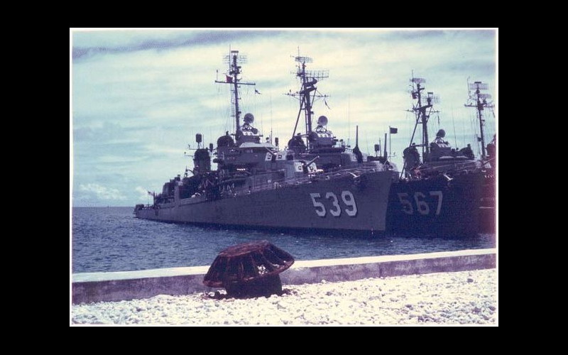 USS Tingey (DD 539), a typical Fletcher class destroyer, re-fuels at Midway Island in 1962. USS Watts (DD 567) is inboard. (Photo by John Samuelson)